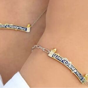 Disney Gold and Navy Necklace and Bracelet with Crislu autograph on boxes